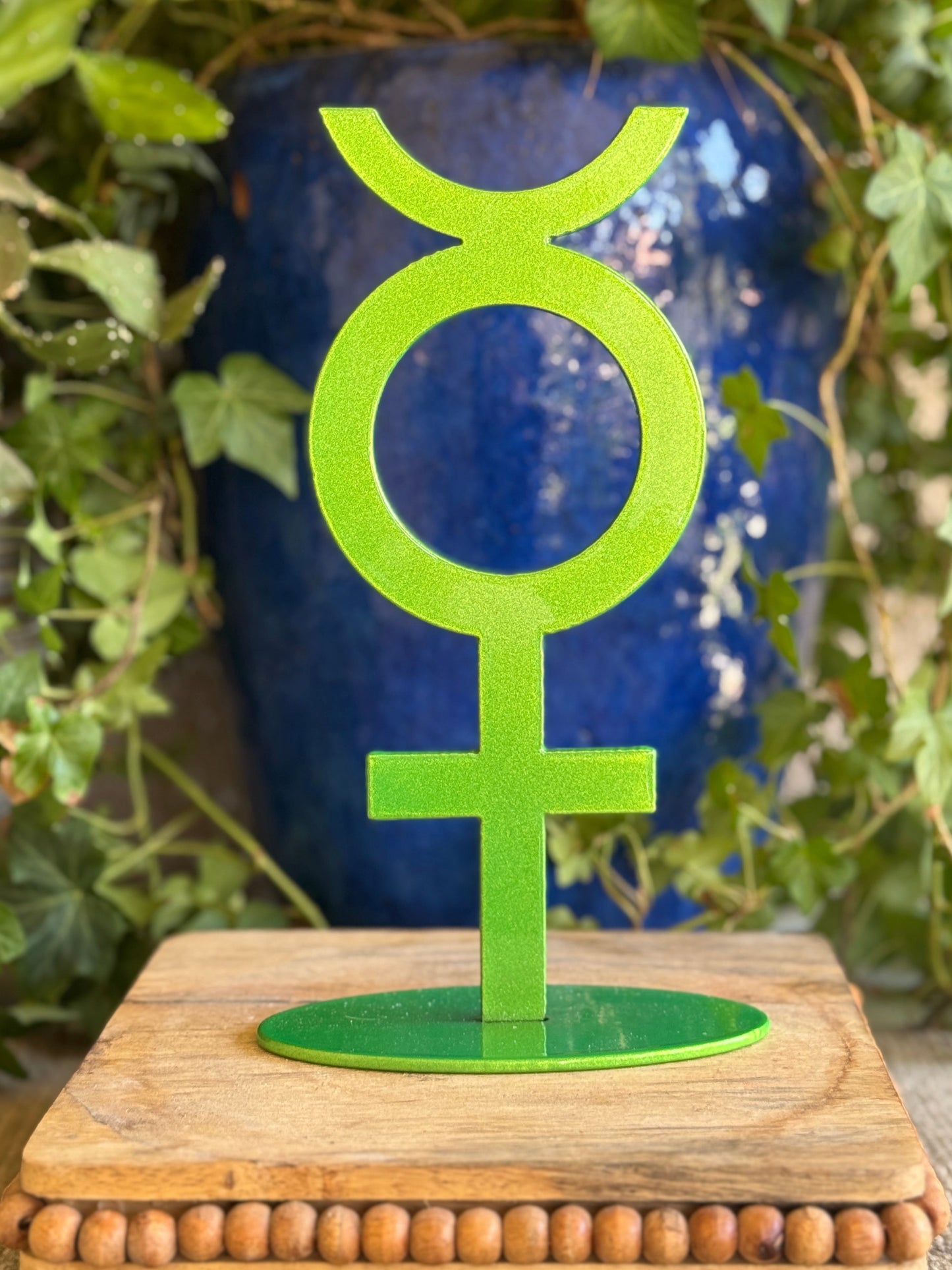 Mercury, green on stand