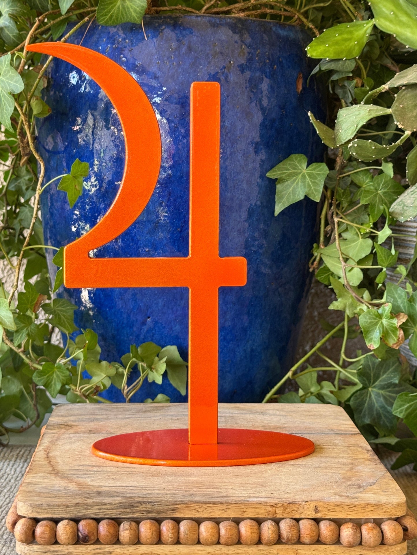 Jupiter, orange on stand