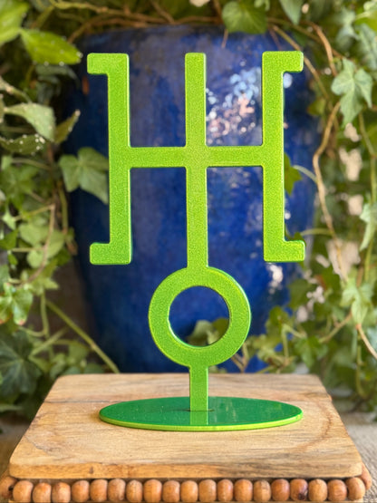 Uranus, green metal statue