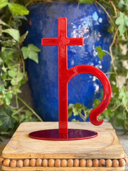 Saturn, red metal statue