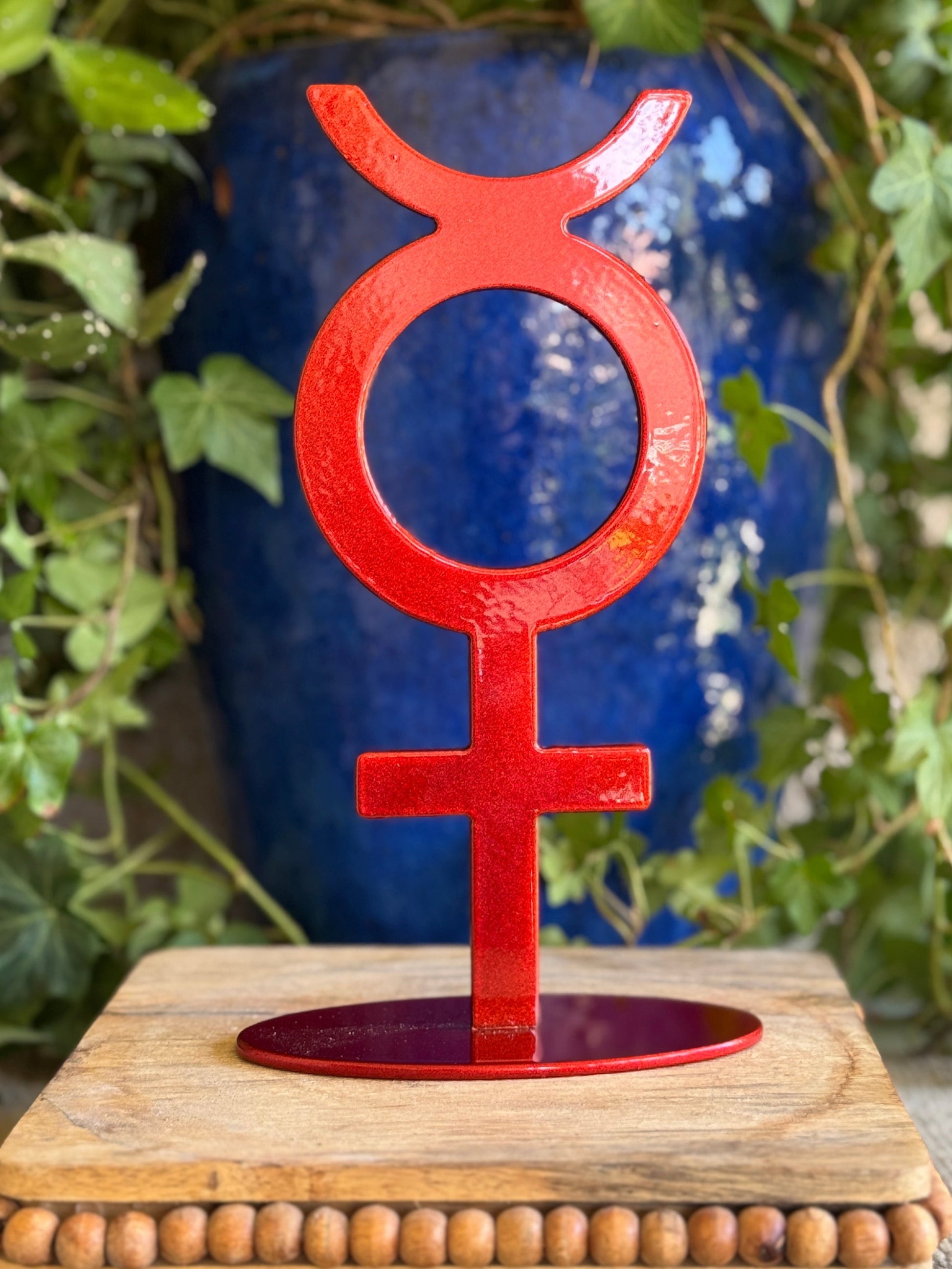 Mercury, red on stand