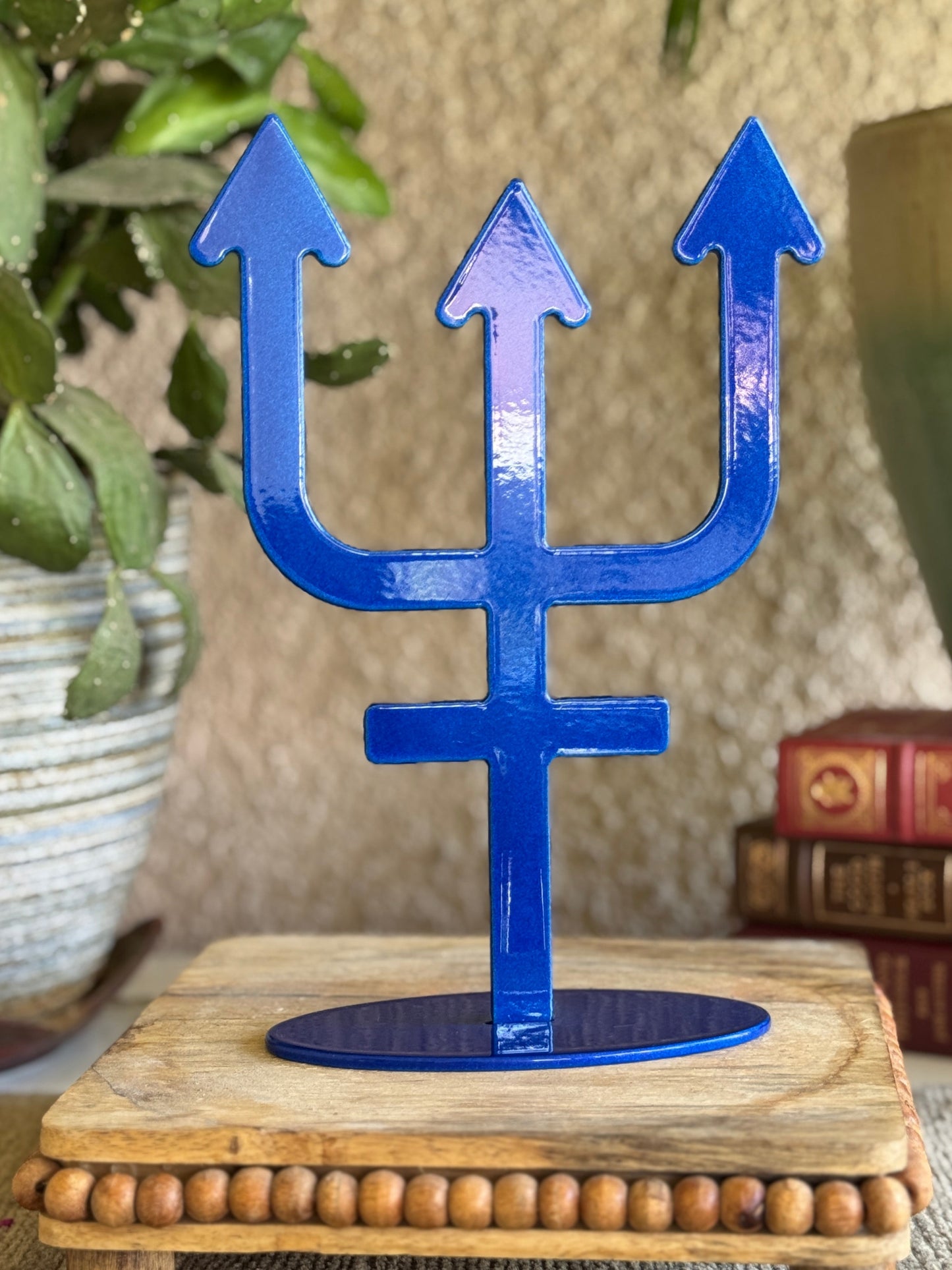 Neptune, blue metal statue